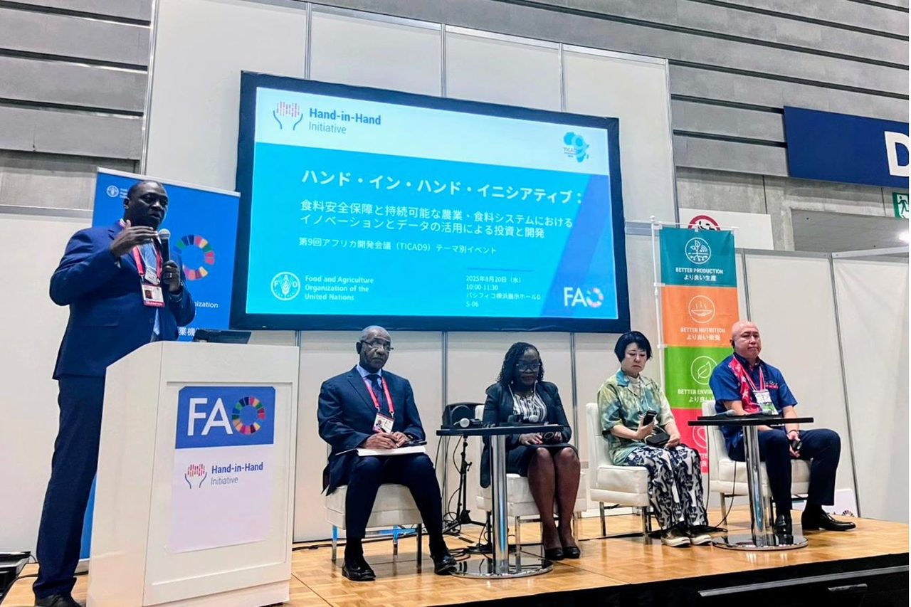 Hervé Ouédraogo speaking at a Hand-in-Hand Initiative event during TICAD9